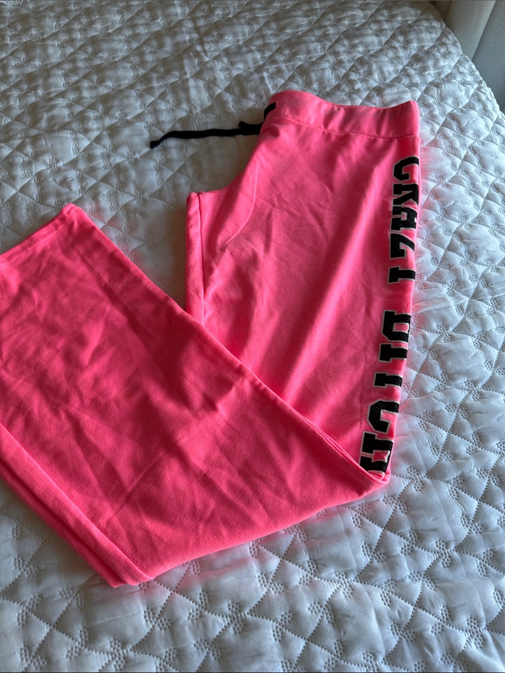 Spencer's Bright Neon Pink Fleece sweatpants with Black Logo